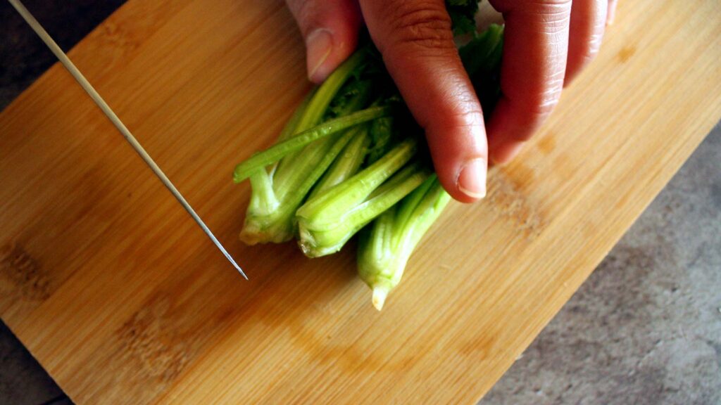 Cutting cilantro stems